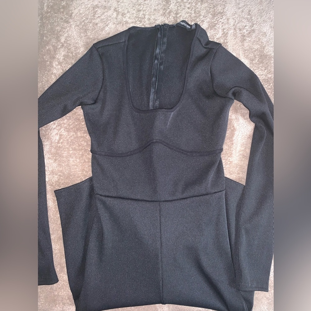 Prettylittlething ribbed black jumpsuit.